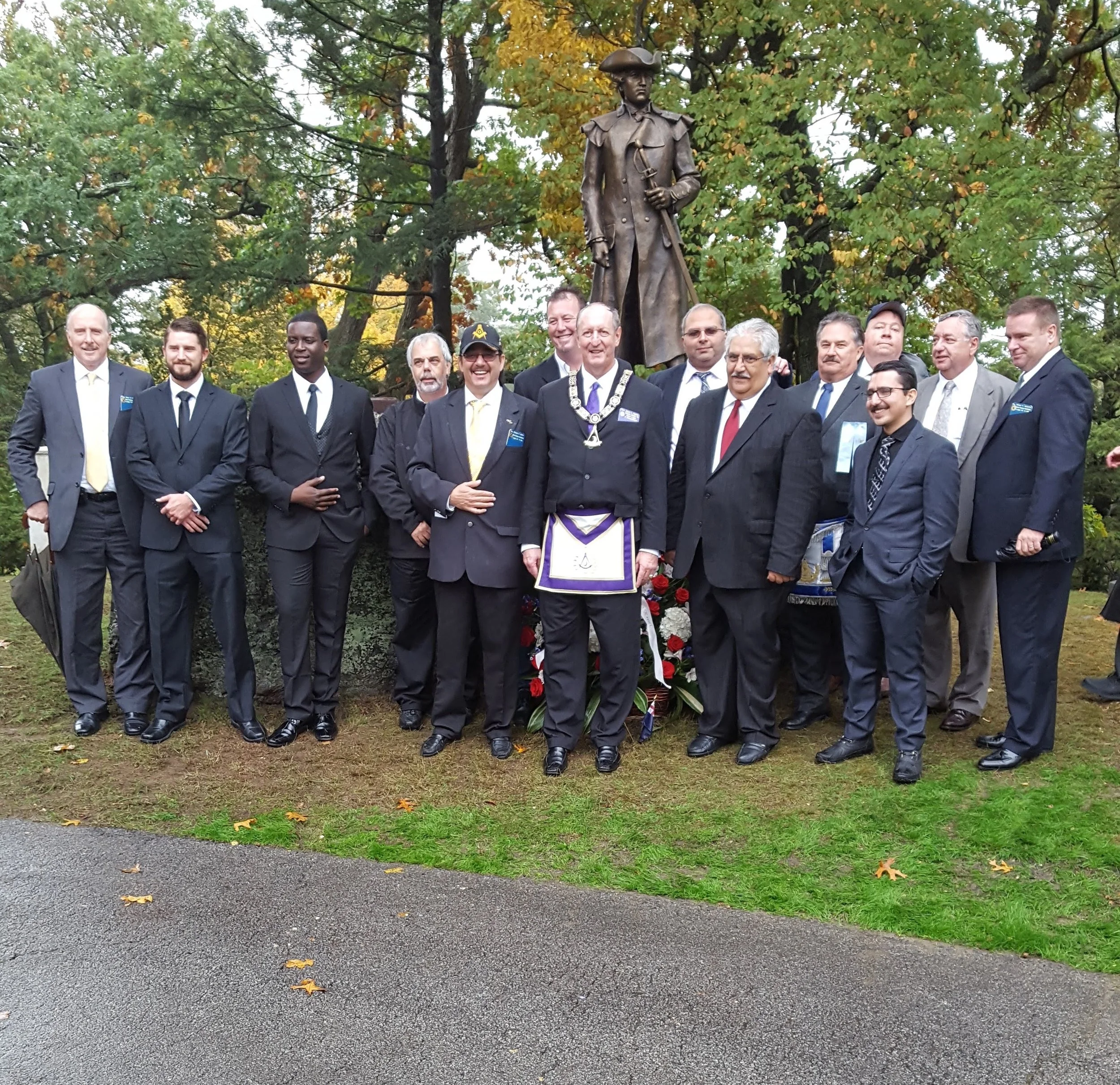 Brethren of the West Roxbury–Dorchester Lodge gathered by the Joseph Warren statue